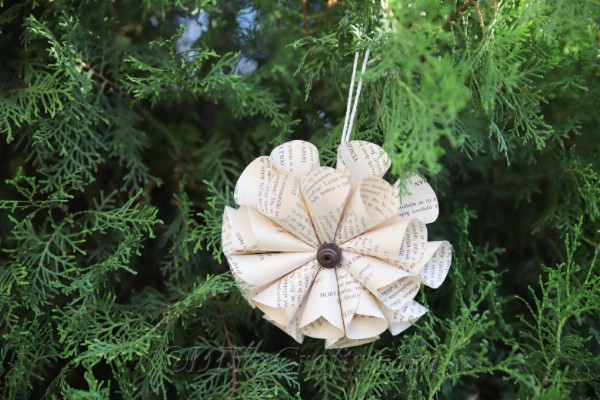 Let’s make paper flowers out of old book pages.