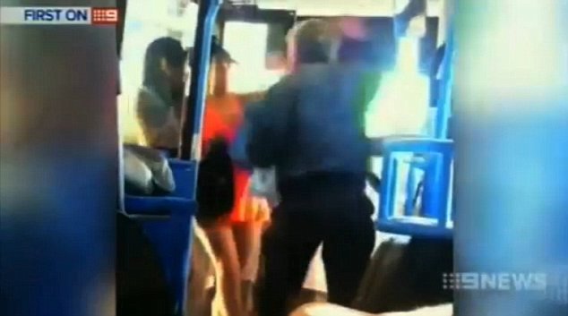 Mobile phone footage shot by another passenger showed two women punching, kicking and spitting at an elderly man while hurling insults