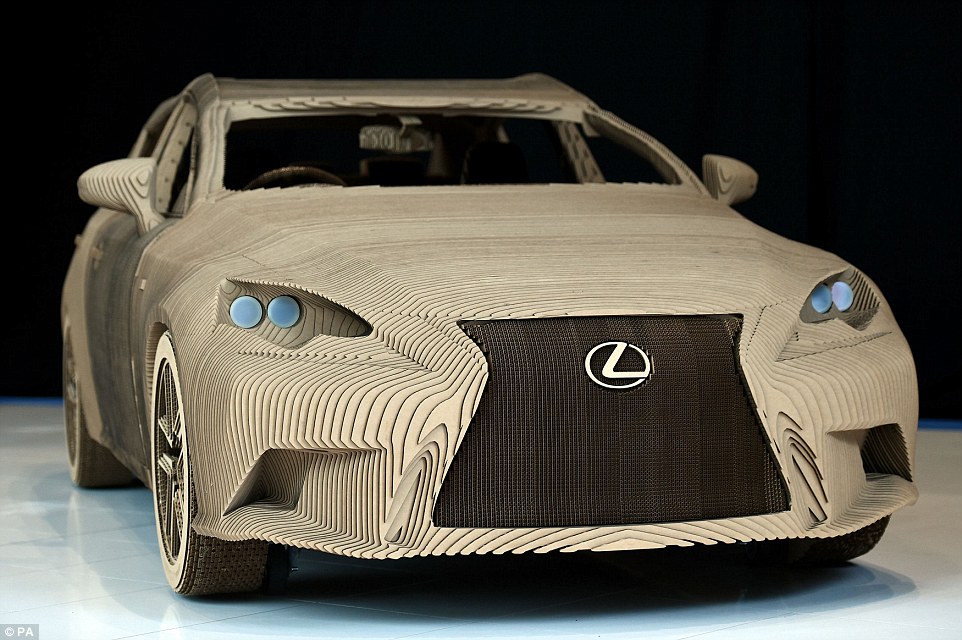 The full scale cardboard replica of the Lexus IS has fully fitted interior, functioning doors, headlights and wheels, with an electric motor mounted on its steel and aluminium frame.