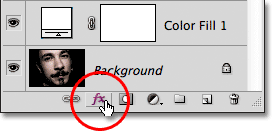 Clicking the Layer styles icon in the Layers panel in Photoshop.