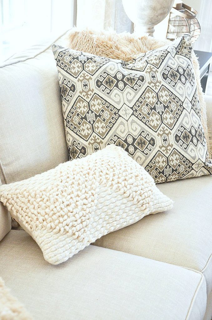 trio of neutral colored pillows